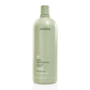 Aveda Pure Abundance champú, botella visible para aportar volumen