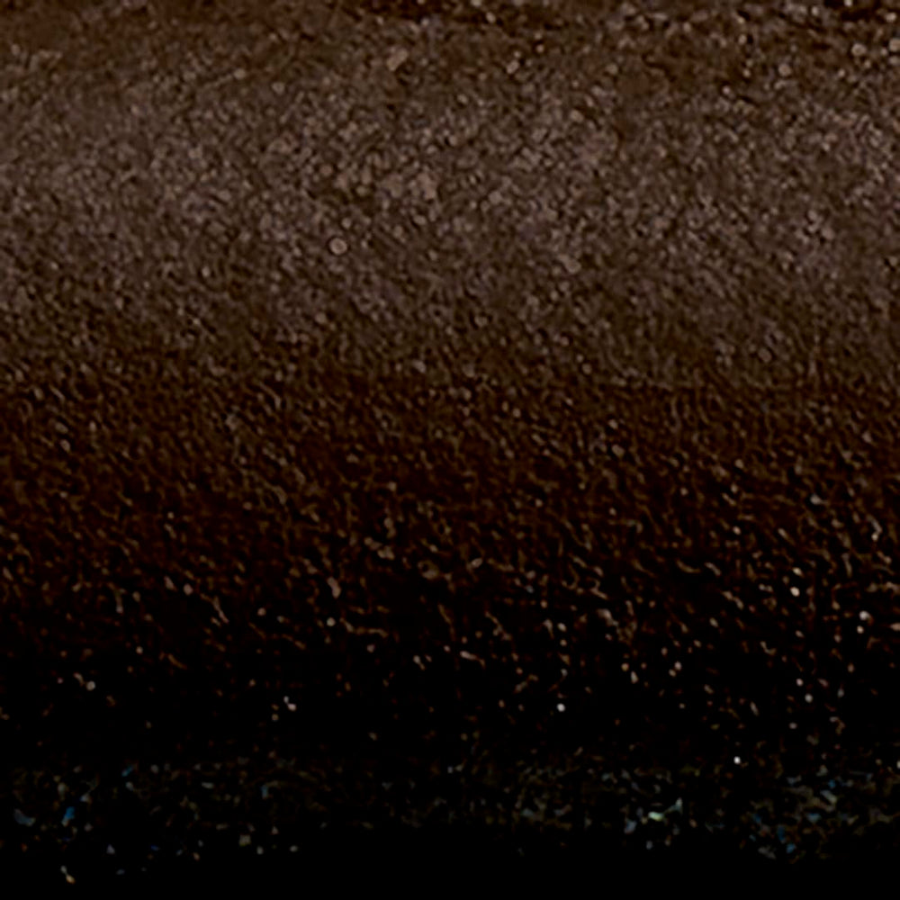 Delineador Avon Glimmersticks en estuche compacto para llevar en bolsa.