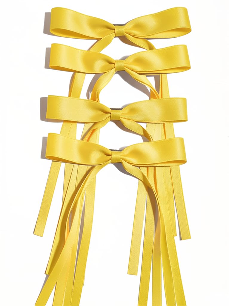 Lazo para cabello Ayesha amarillo con cinta larga, ideal para peinados.
