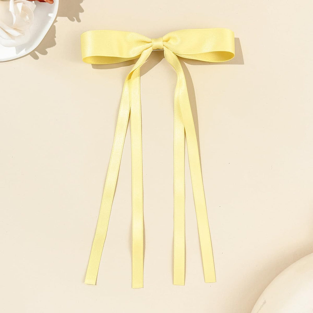 Set de cuatro lazos amarillos para ocasiones especiales.