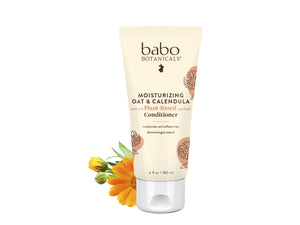 Acondicionador Babo Botanicals en botella de avena y caléndula; hidratación suave para cabello sensible.