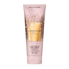 Bath & Body Works Champagne Toast crema corporal en botella, hidratación diaria.