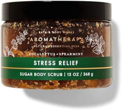 Bath & Body Works frasco exfoliante con aceites nutritivos, ideal para ducha revitalizante.