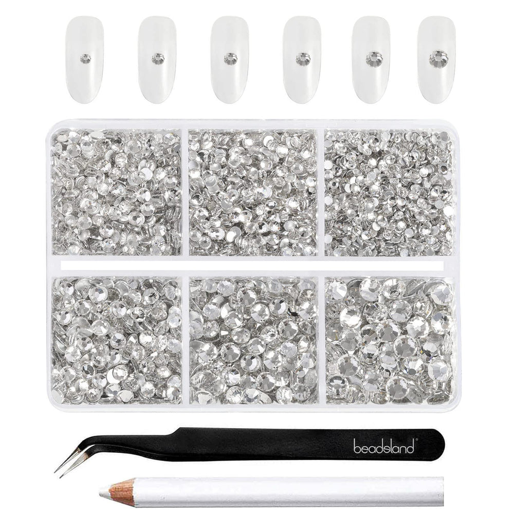 Beadsland: piedras de cristal claras en caja, ideal para decoración de uñas.