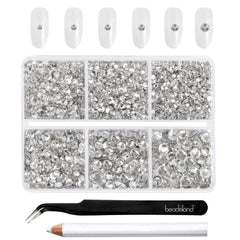 Beadsland: piedras de cristal claras en caja, ideal para decoración de uñas.