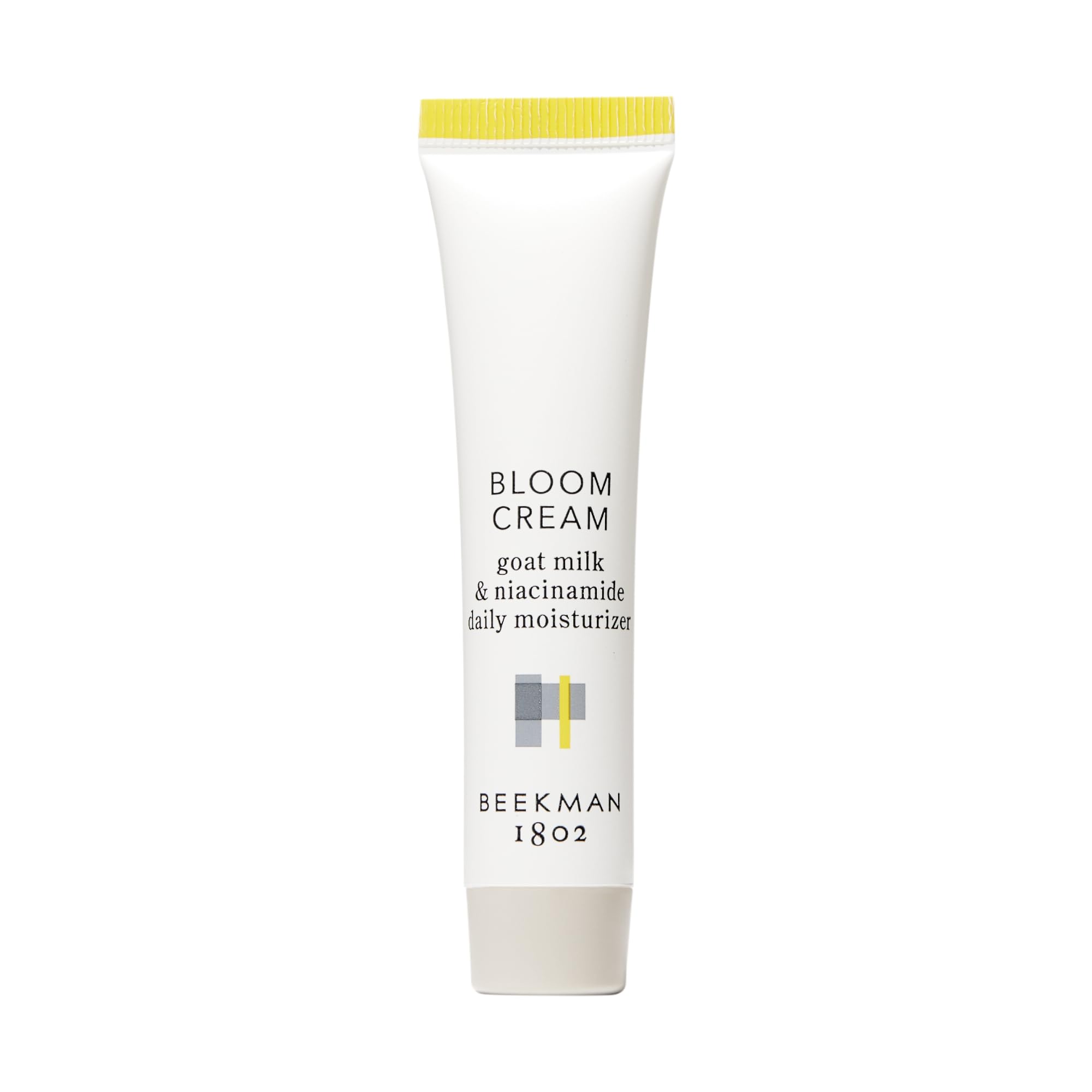 Beekman 1802 Bloom Cream, textura suave en la palma para hidratación ligera diaria.