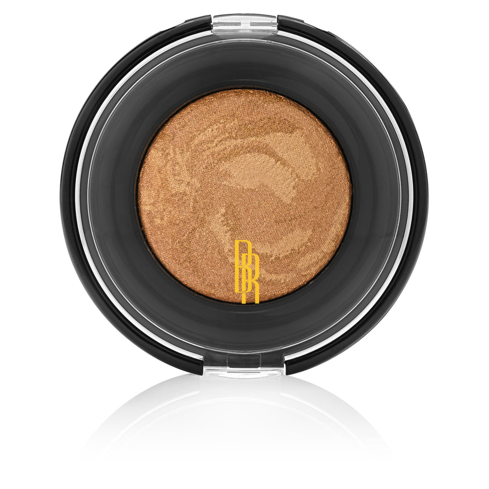Black Radiance Artisan Color Gingersnap, envase visible, bronceado suave con destellos luminosos