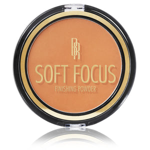 Black Radiance polvo bronce cremoso en frasco abierto para un acabado suave