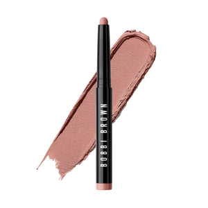 Envase compacto de Bobbi Brown Sombra Crema Stick para retoques diarios.