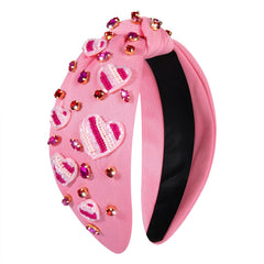 Diadema boderier con corazón rosado y cristales para San Valentín.