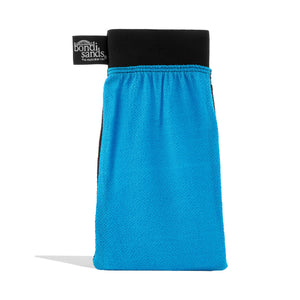 Bondi Sands guante exfoliante frente visible para bronceado uniforme.