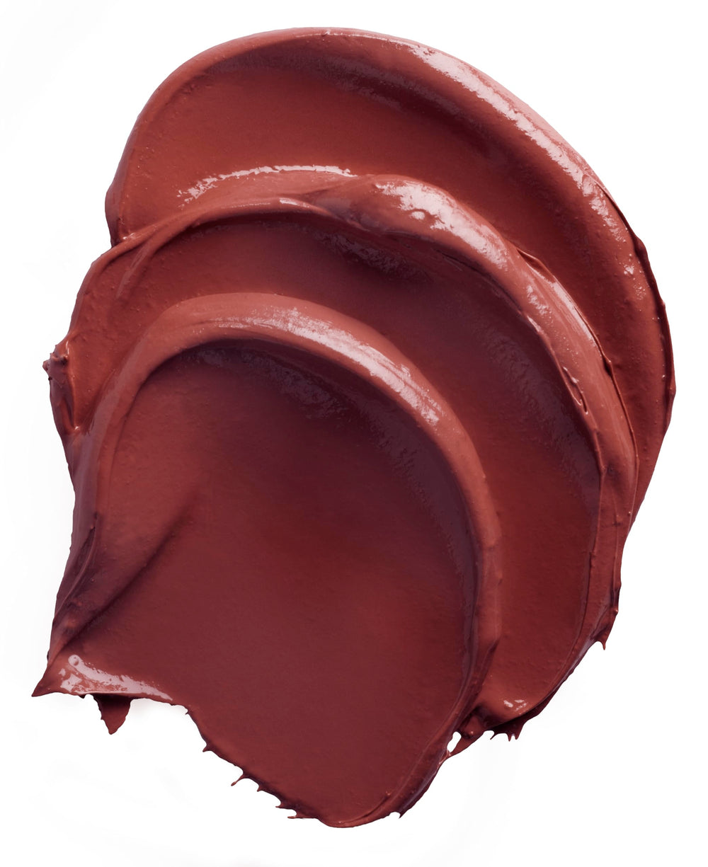 Burt's Bees Lipstick Russet River swatch en piel, color profundo y acabado satinado.