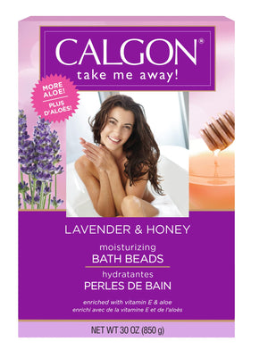 Calgon bolas de baño lavanda-miel flotando para un baño relajante e hidratante.