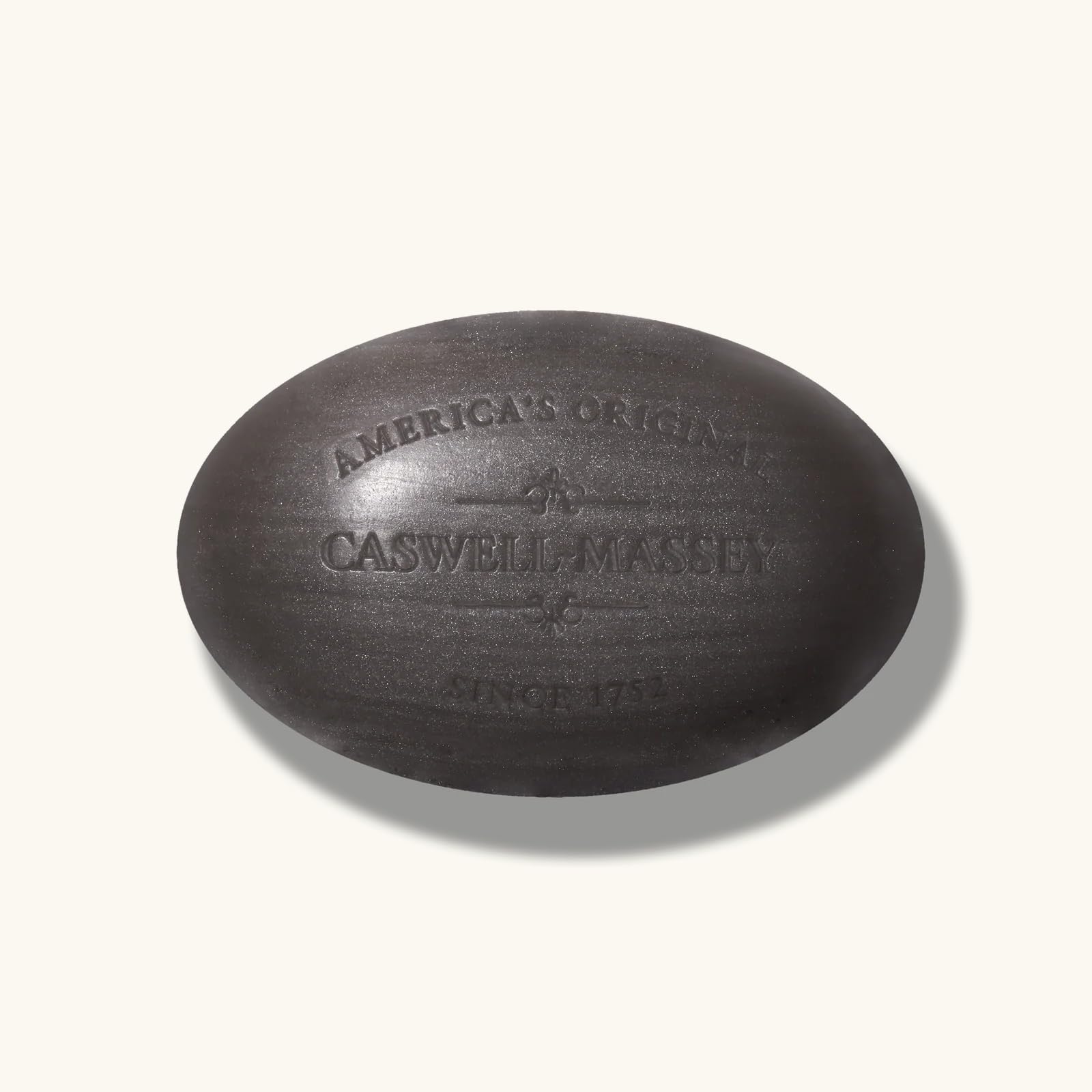 Caswell-Massey jabon sándalo, diseño elegante que evoca tradición artesanal.