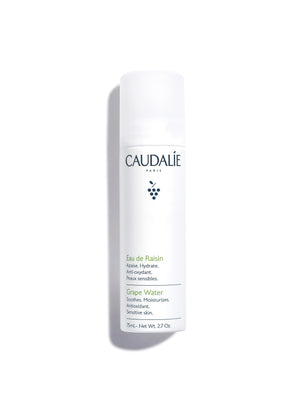 Caudalie agua de uva: neblina facial para hidratación ligera durante el viaje.