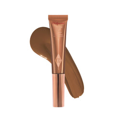 Charlotte Tilbury Hollywood Contorno Líquido con aplicador cushion para definir pómulos con precisión.