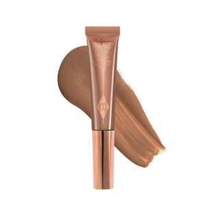Charlotte Tilbury Hollywood Liquid Contour Wand, aplicador cushion para una aplicación precisa en pómulos.