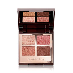 Paleta Pillow Talk de Charlotte Tilbury con tono rosado perlado para mirada suave.