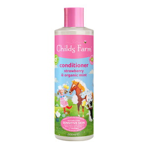 Acondicionador Childs Farm para niños, fresa y menta, suaviza rizos y cuida piel sensible.