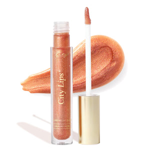 City Beauty City Lips, labios más llenos con brillo rosado-oro.