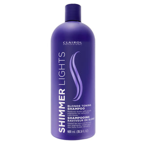 Clairol Profesional Purpura – botella que neutraliza tonos amarillos en rubios.