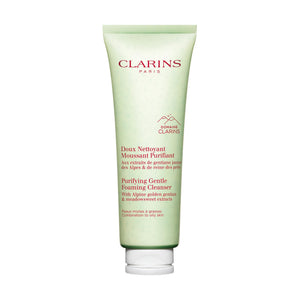 Clarins limpiador facial espumoso purificante en botella, ideal para piel mixta.