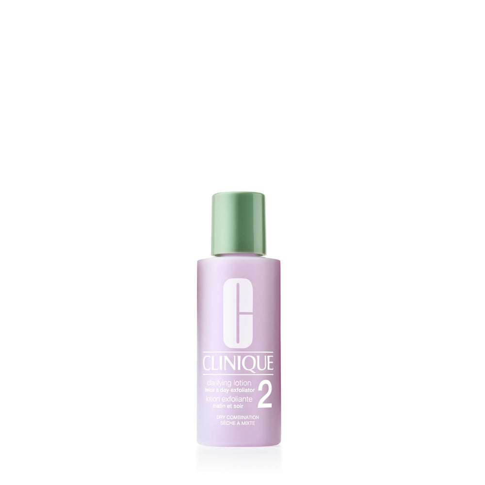 Loción aclaradora Clinique 2: botella mini para piel seca, exfoliación suave y diaria.