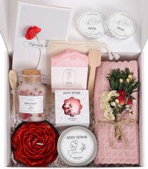 Vela en forma de flor de Coralogo Rose Spa para un ambiente calmante.