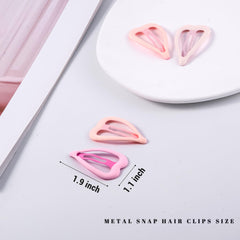 Pinzas corazón de metal rosa para peinados elegantes y prácticos