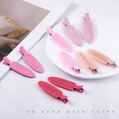 Pinzas Cptots en color rosa rosado, estilo suave y chic.