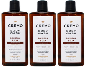 Cremo Jabón de Ducha Bourbon y Roble, botella vertiendo, experiencia vigorizante matutina.