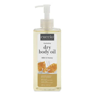 Cuccio Naturale Aceite Seco Leche y Miel, derrame de botella, hidratación ligera sin grasa.