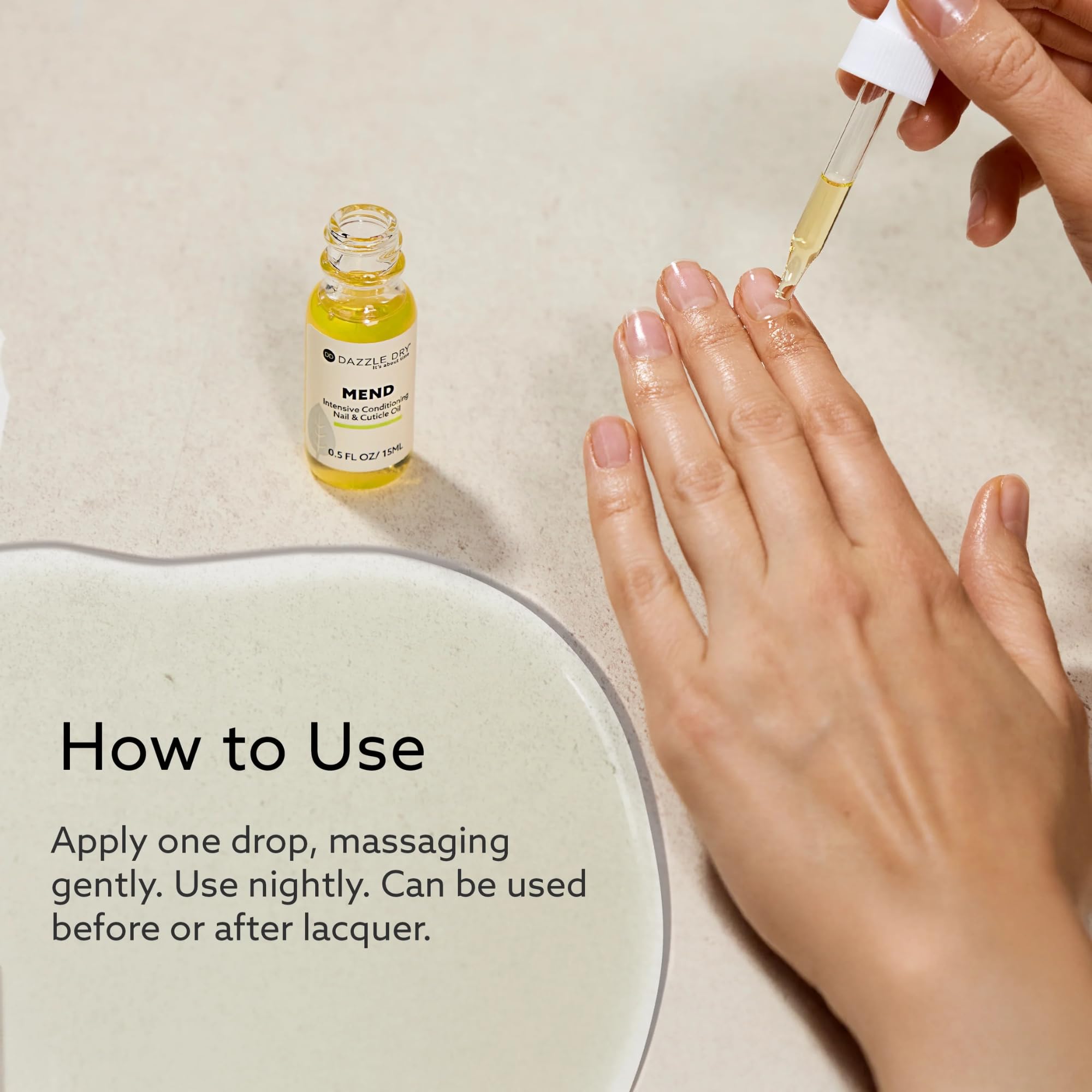 Envase práctico de Dazzle Dry Mend Nail Repair Oil con diseño minimalista.