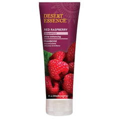 Desert Essence Frambuesa Roja Champú: etiqueta destacando limpieza suave.