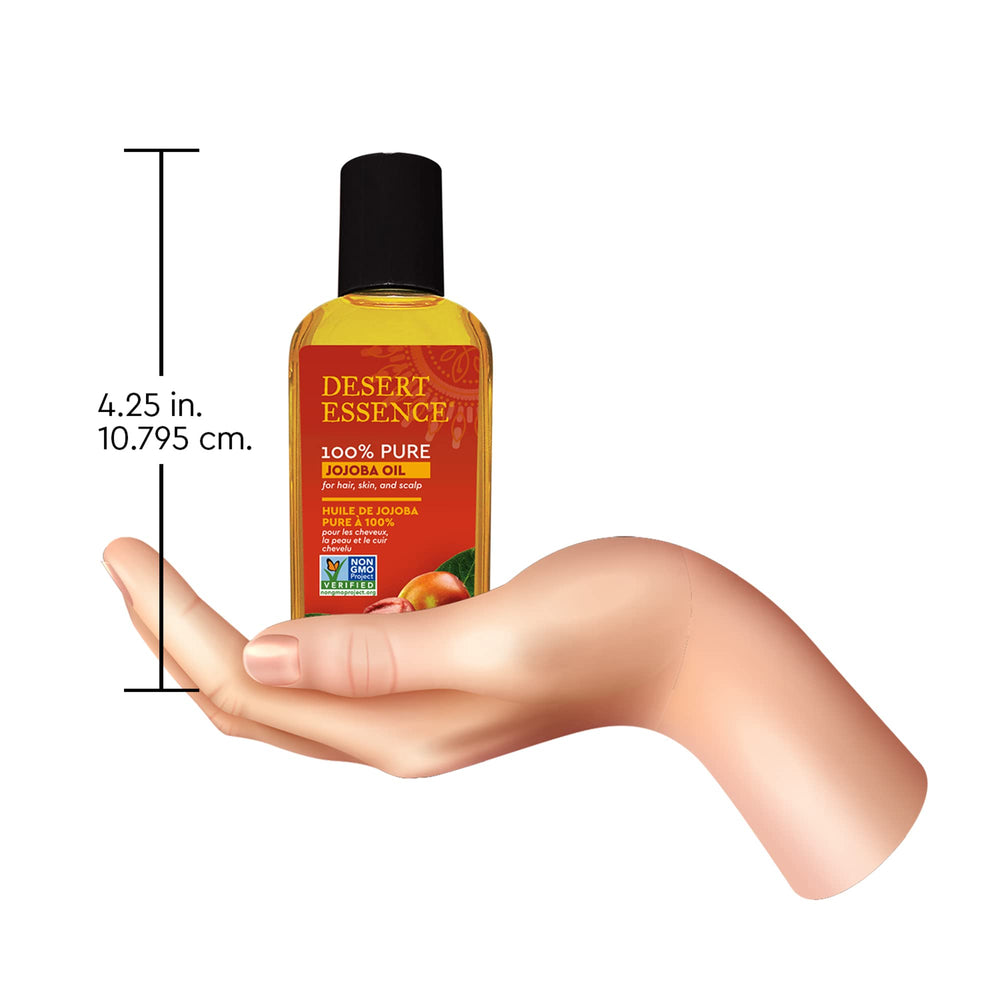 Desert Essence Aceite de Jojoba: vegano y libre de OGM para belleza consciente.