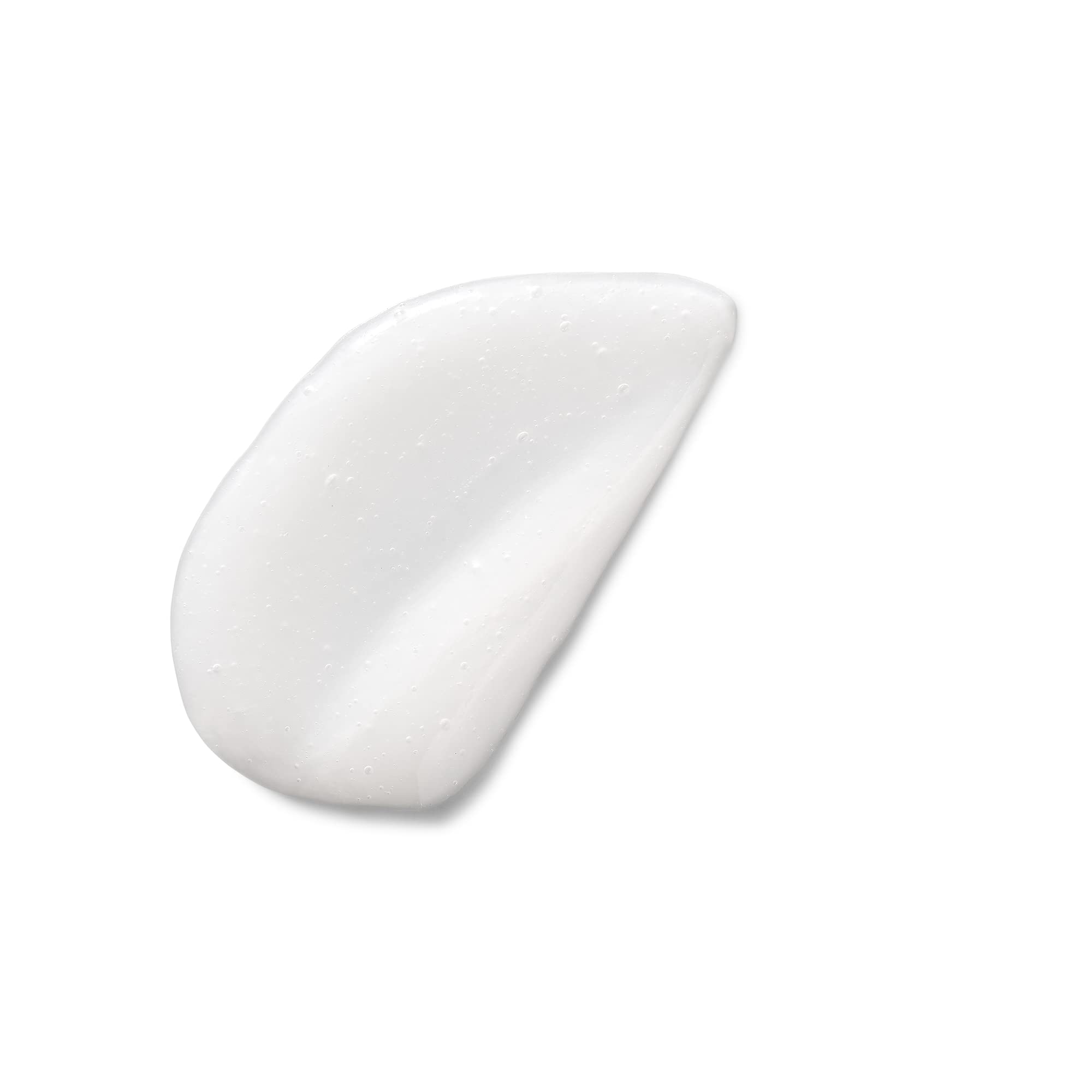 Devacurl Mist of Wonders: manos sosteniendo el spray para rizos definidos y sostenibilidad.