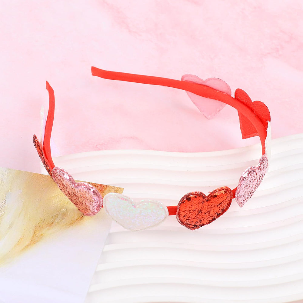 La DIUEWOW diadema glitter rosado añade un toque chic para eventos.
