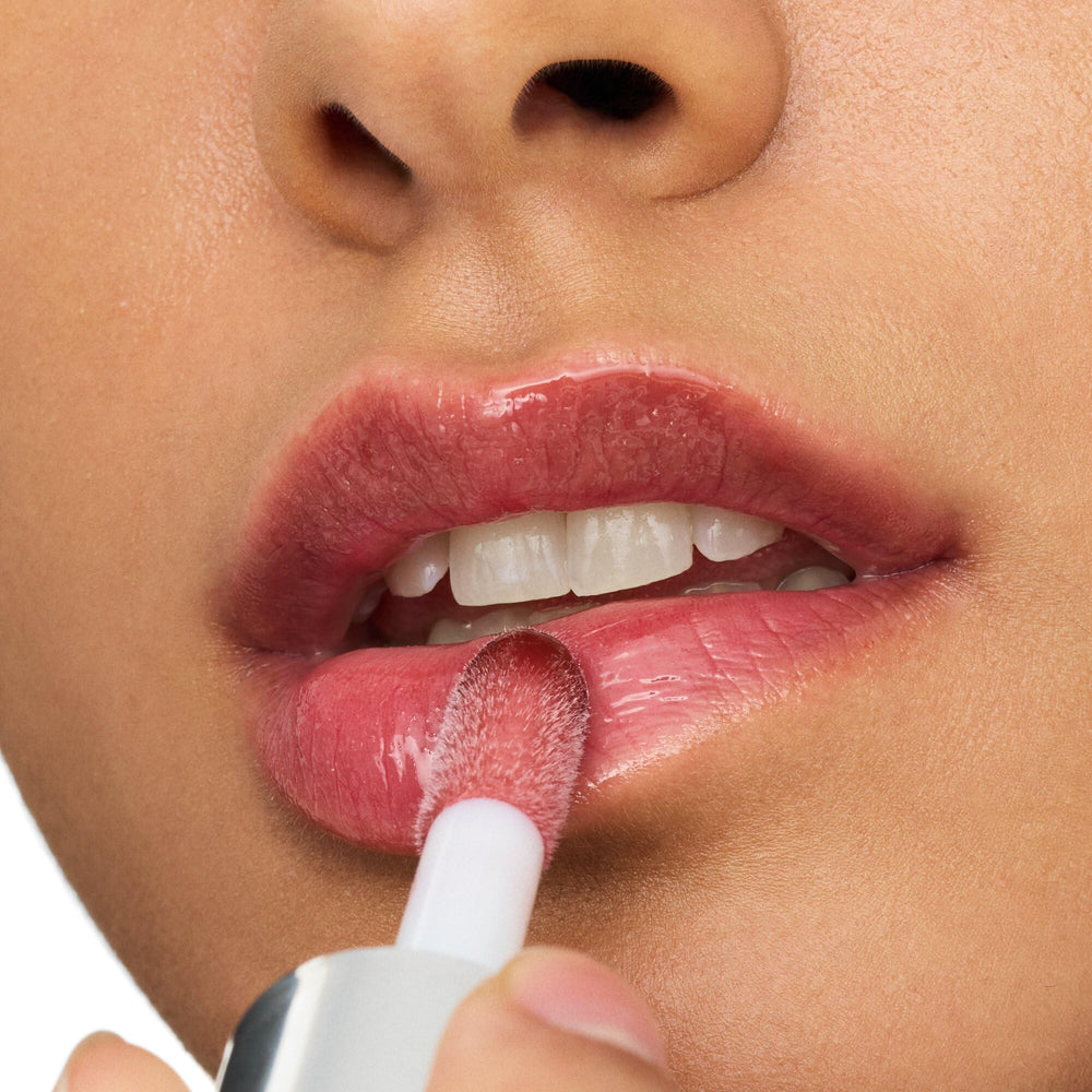 essence Hydra Kiss Lip Oil ácido hialurónico para hidratación profunda.