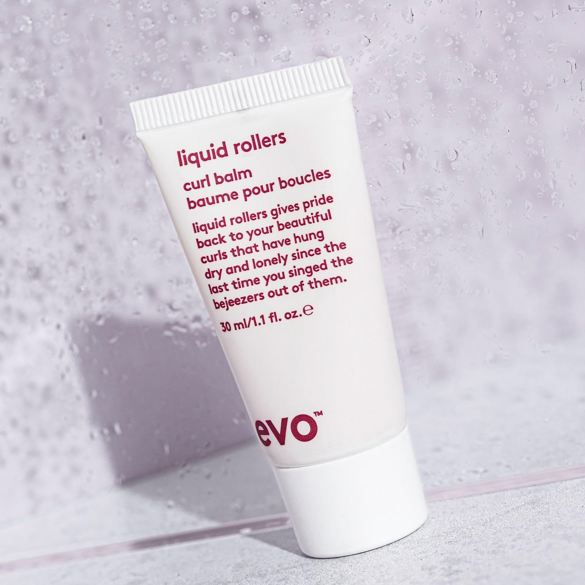Envase de viaje EVO Liquid Rollers Balm, tamaño compacto para retoques.