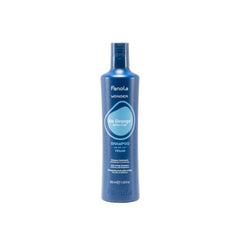 Fanola Wonder Champú Azul, botella, neutraliza tonos naranjas y protege el color.
