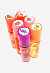 Feel Foxy brillo labial frutal con sabor beso, aplicación suave para uso diario y ligero tintado.