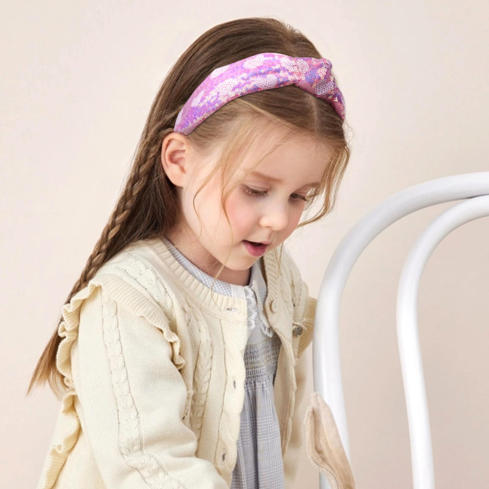 Diadema Fishdown para fiestas, brillo sutil y elegante.