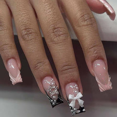 Uñas press-on Foccna rosa con rhinestones para un look glamoroso.