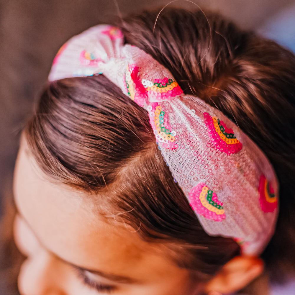 FROG SAC diadema con lentejuelas rosa: favorece looks llamativos sin irritar la piel.