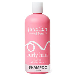 Function of Beauty botella de champú para rizos con definición y brillo.