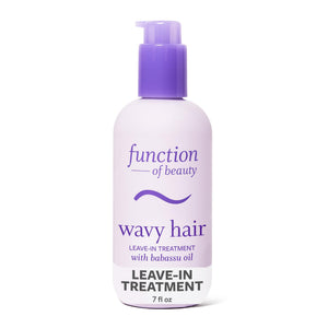Function of Beauty: botella mostrando ondas definidas y brillo suave