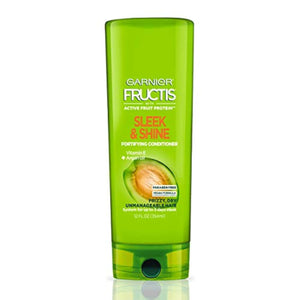 Acondicionador Garnier Fructis, botella con Argán marroquí para cabello suave.