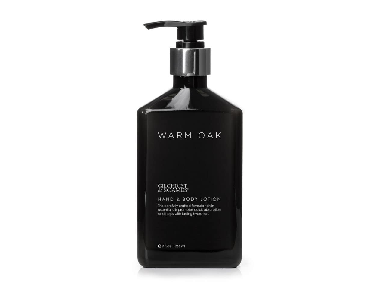 Gilchrist & Soames Warm Oak frasco de loción para hidratación suave de manos y cuerpo.
