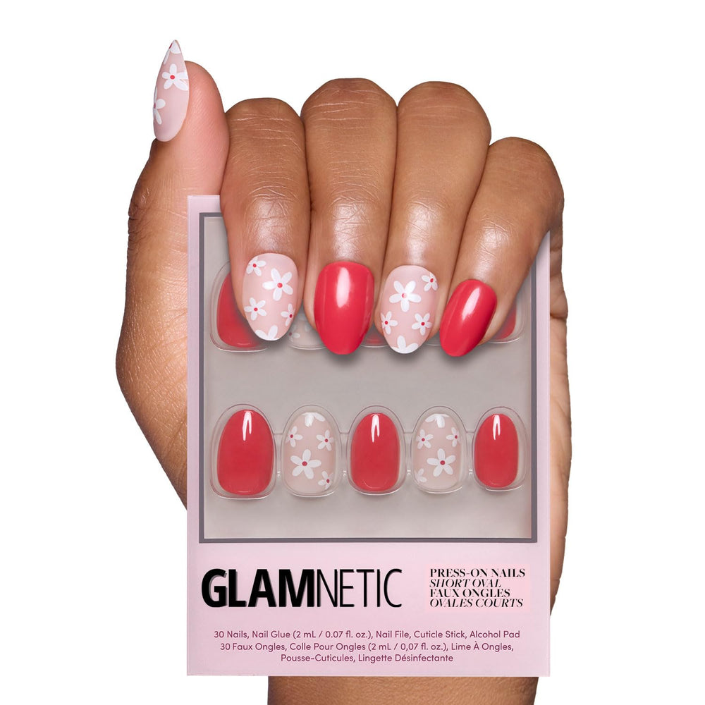 Glamnetic uñas postizas rojas brillantes con acento floral, estilo casual.