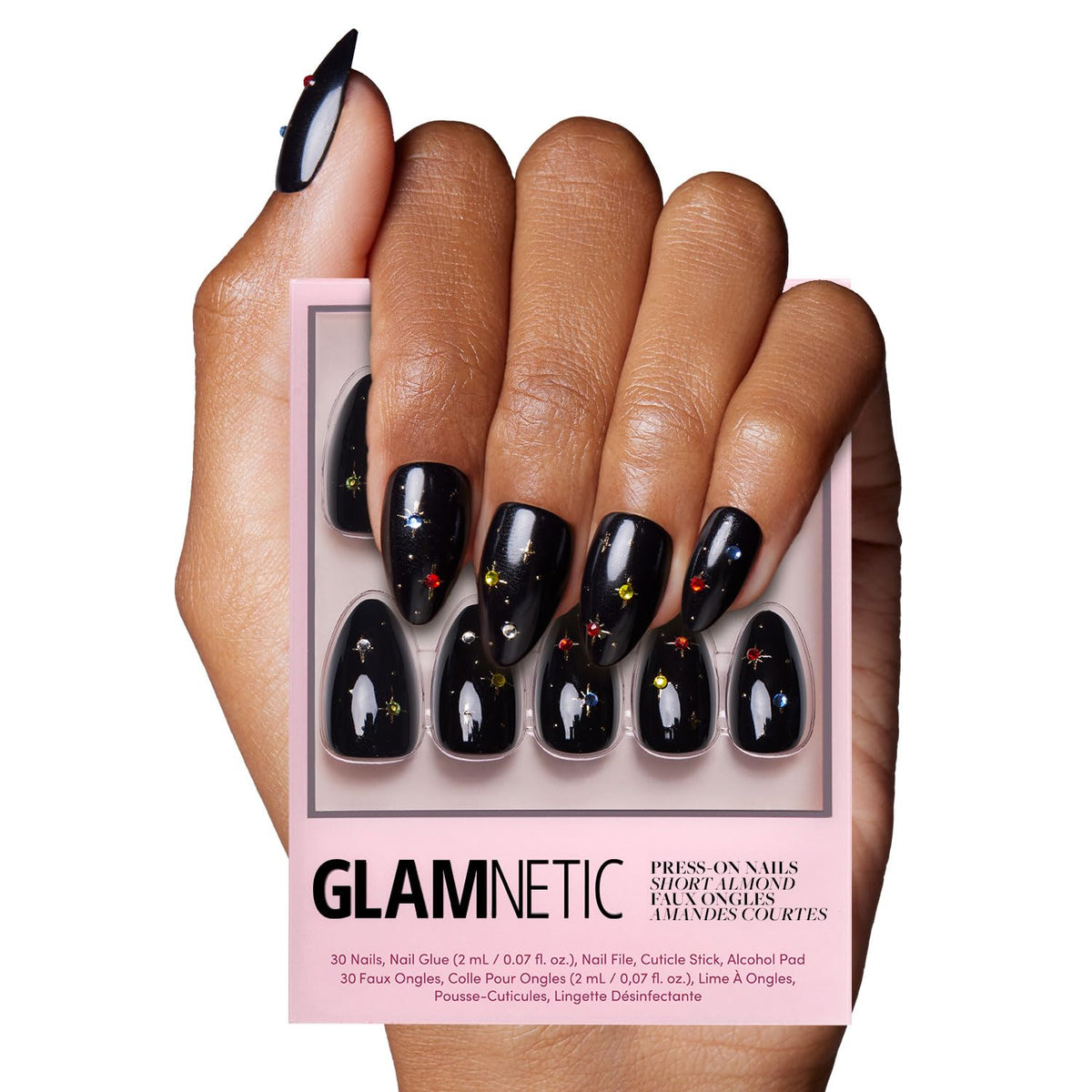 Glamnetic Winter Comet: uñas negras con gemas, ideal para looks festivos.